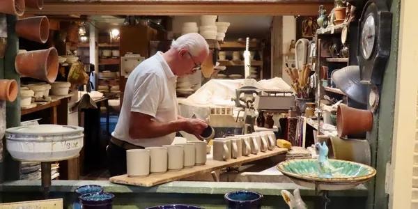 Potter at work in the Beaumont Pottery studio