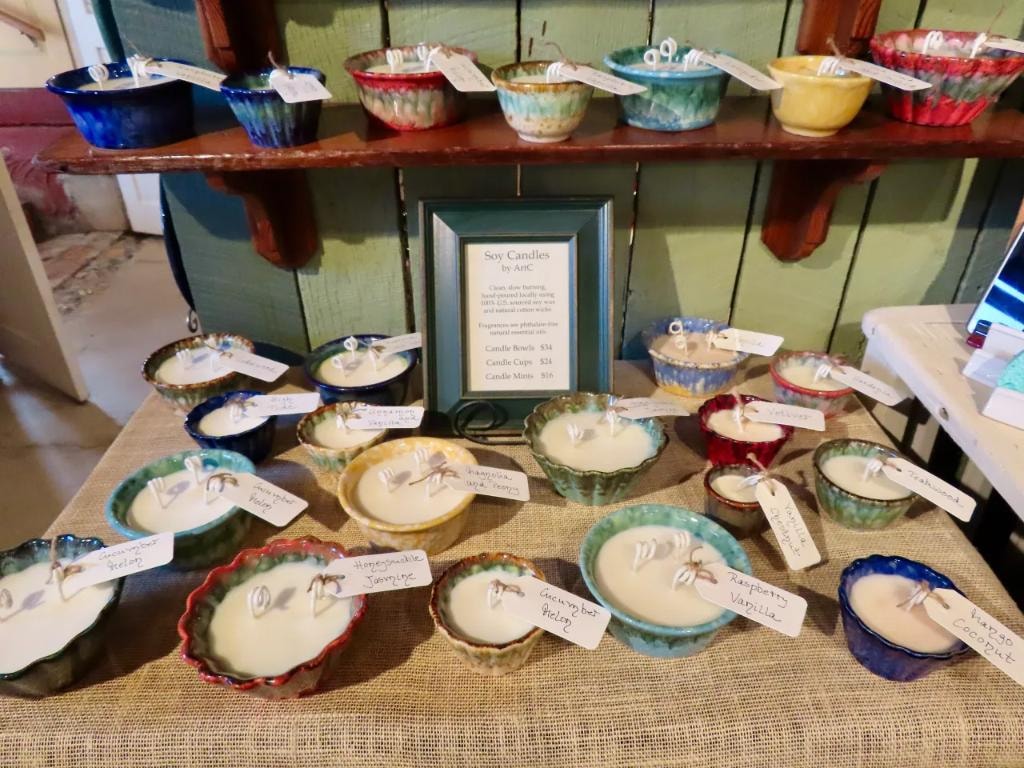 Soy candles poured into handmade ceramic bowls in many glaze colors